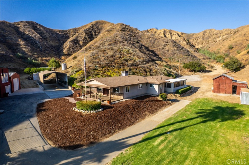 30300 Live Oak Canyon Road Redlands, CA 92373 - Photo 56 of 67 a view of a house with a yard