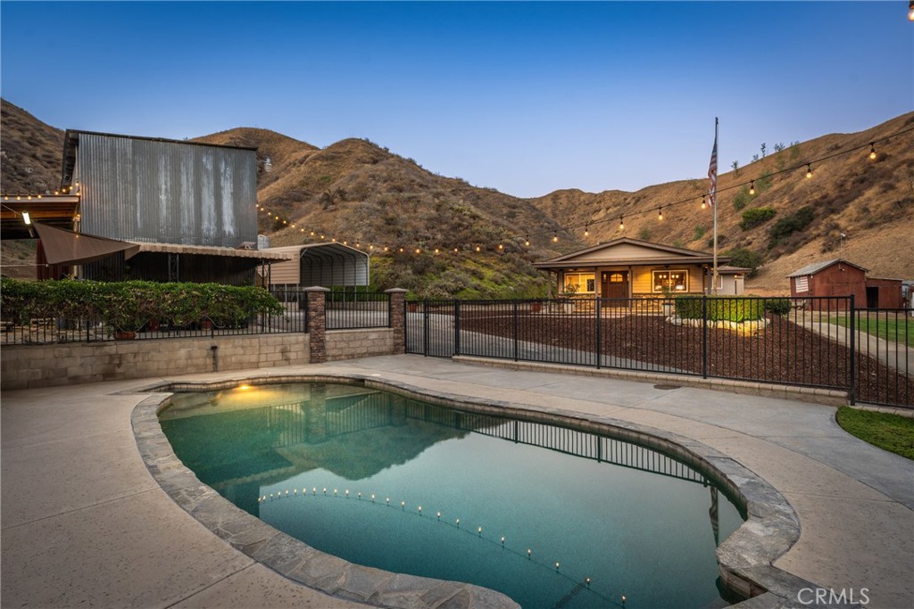 30300 Live Oak Canyon Road Redlands, CA 92373 - Photo 7 of 67 a view of a swimming pool with a patio
