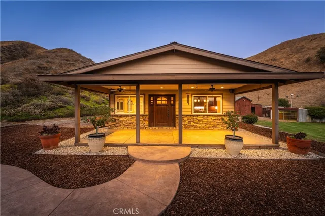 a view of a road with a building in the background