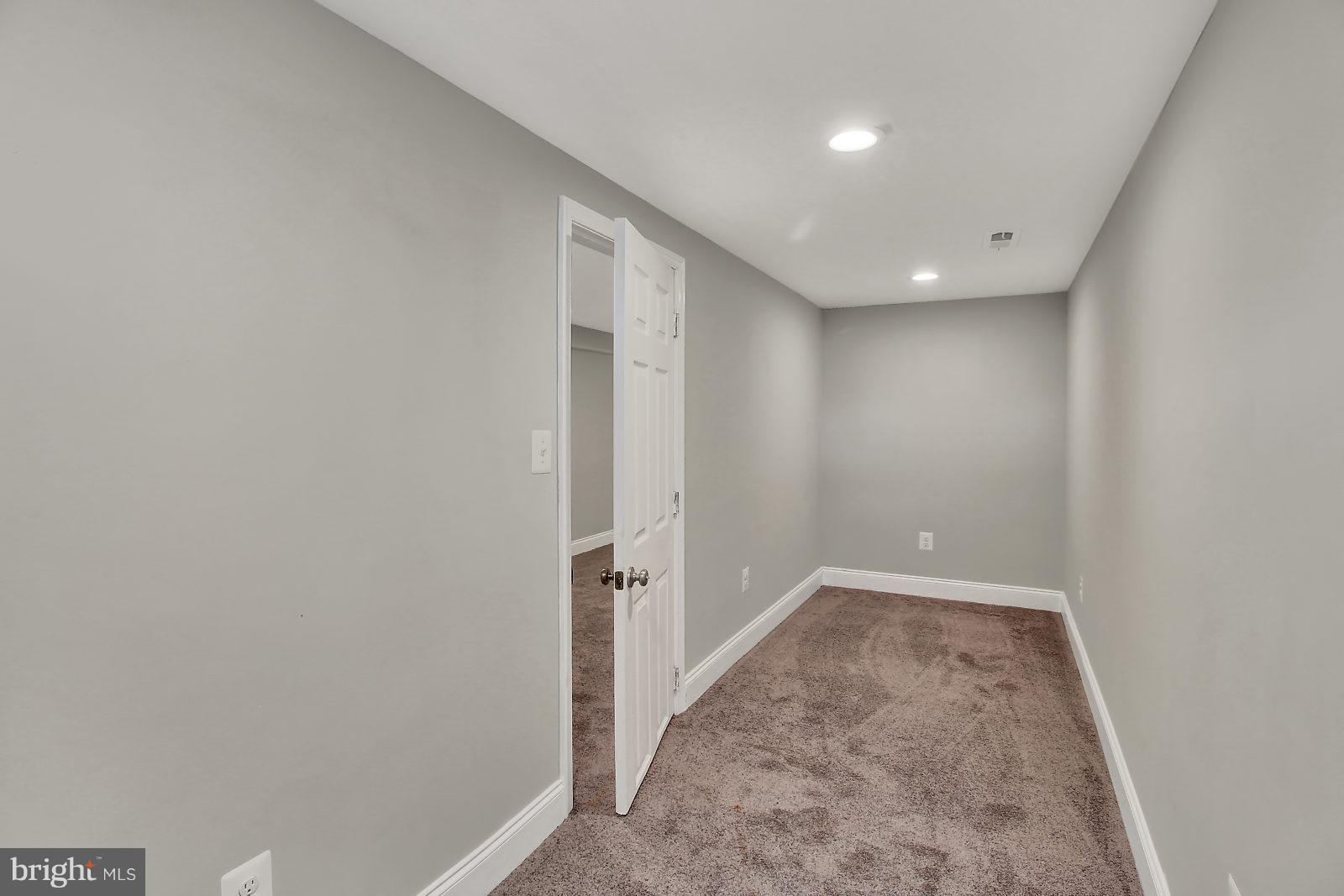 6704 Quander Road Alexandria, VA 22307 - Photo 21 of 27 Basement office, playroom or storage