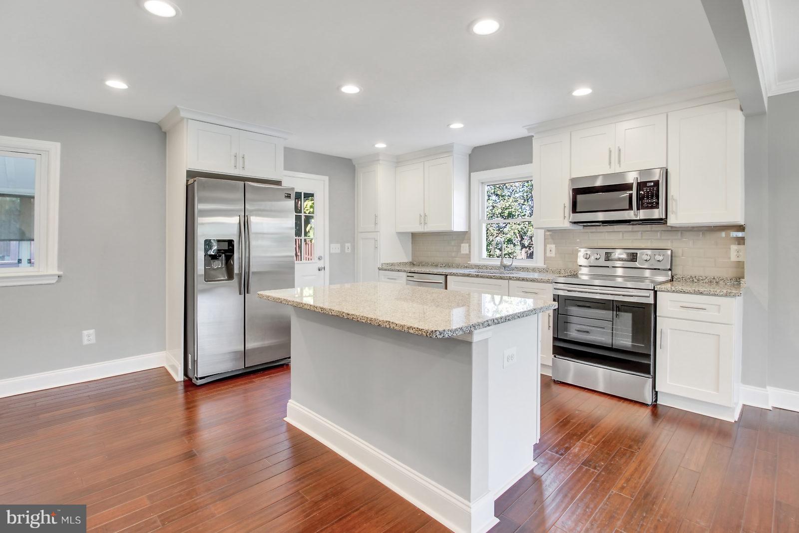 6704 Quander Road Alexandria, VA 22307 - Photo 6 of 27 Open kitchen with Samsung Appliances