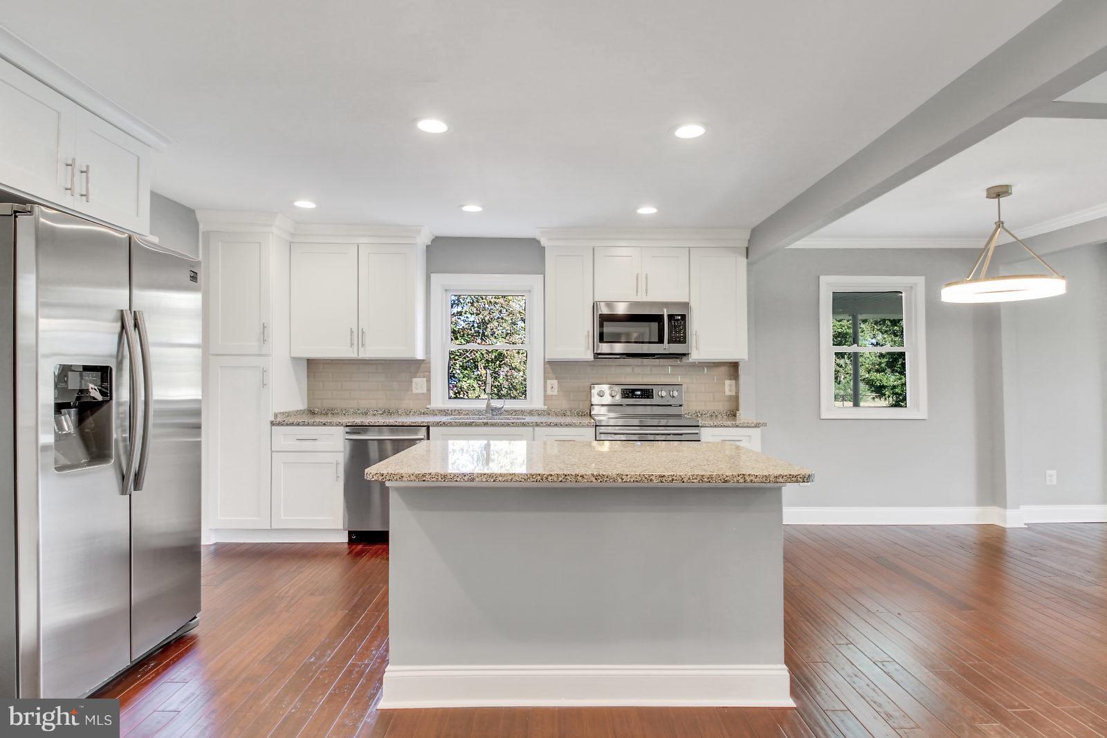6704 Quander Road Alexandria, VA 22307 - Photo 7 of 27 Open kitchen with large island