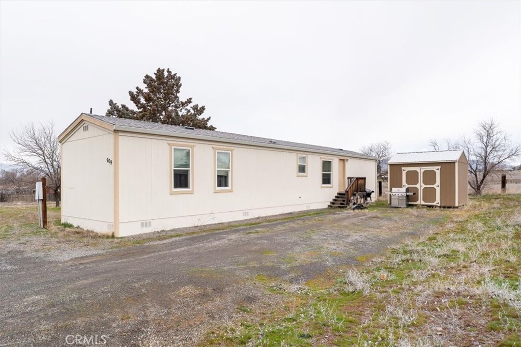 907 Ball Mountain Little Shasta Road Montague, CA 96064 - Photo 11 of 34 a view of a house with a yard