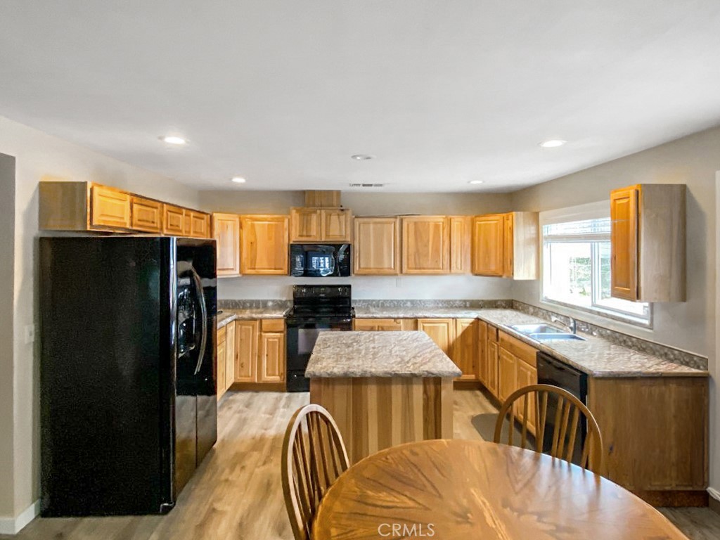 907 Ball Mountain Little Shasta Road Montague, CA 96064 - Photo 12 of 34 a kitchen with granite countertop lots of counter top space and stainless steel appliances