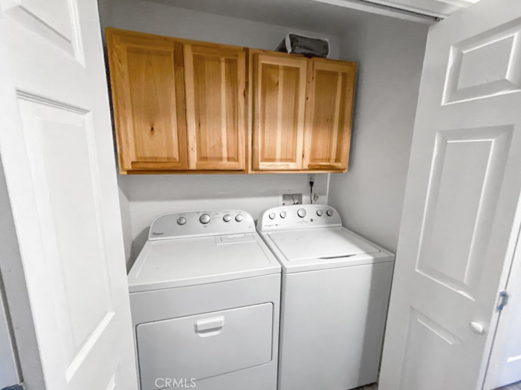 907 Ball Mountain Little Shasta Road Montague, CA 96064 - Photo 20 of 34 a view of storage and utility room with washer and dryer