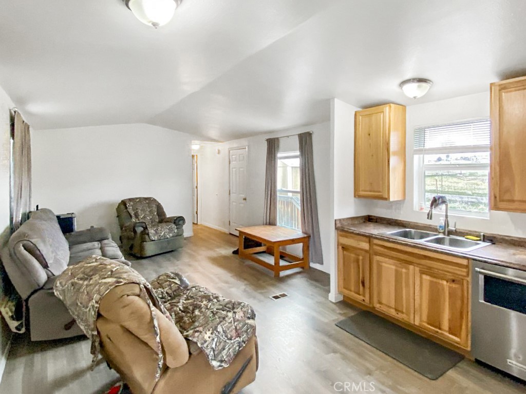 907 Ball Mountain Little Shasta Road Montague, CA 96064 - Photo 23 of 34 a living room with furniture window and wooden floor