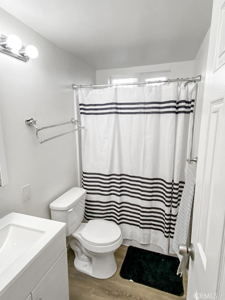 907 Ball Mountain Little Shasta Road Montague, CA 96064 - Photo 27 of 34 a bathroom with a sink a toilet a mirror and shower