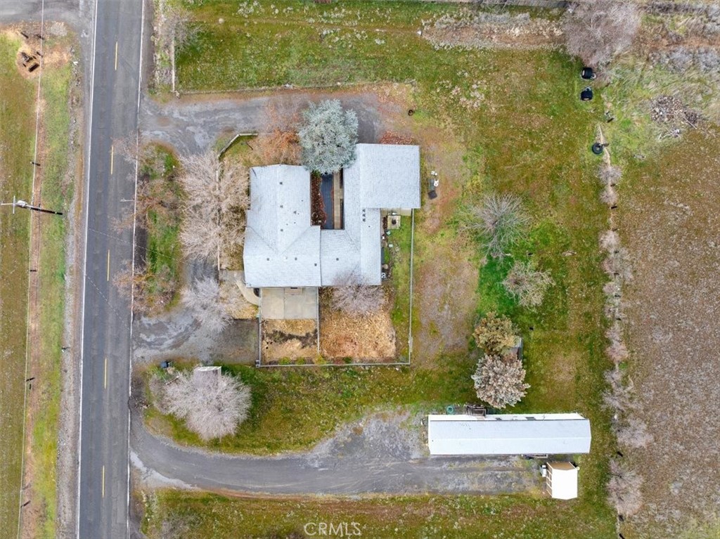 907 Ball Mountain Little Shasta Road Montague, CA 96064 - Photo 3 of 34 aerial view of a house with a yard