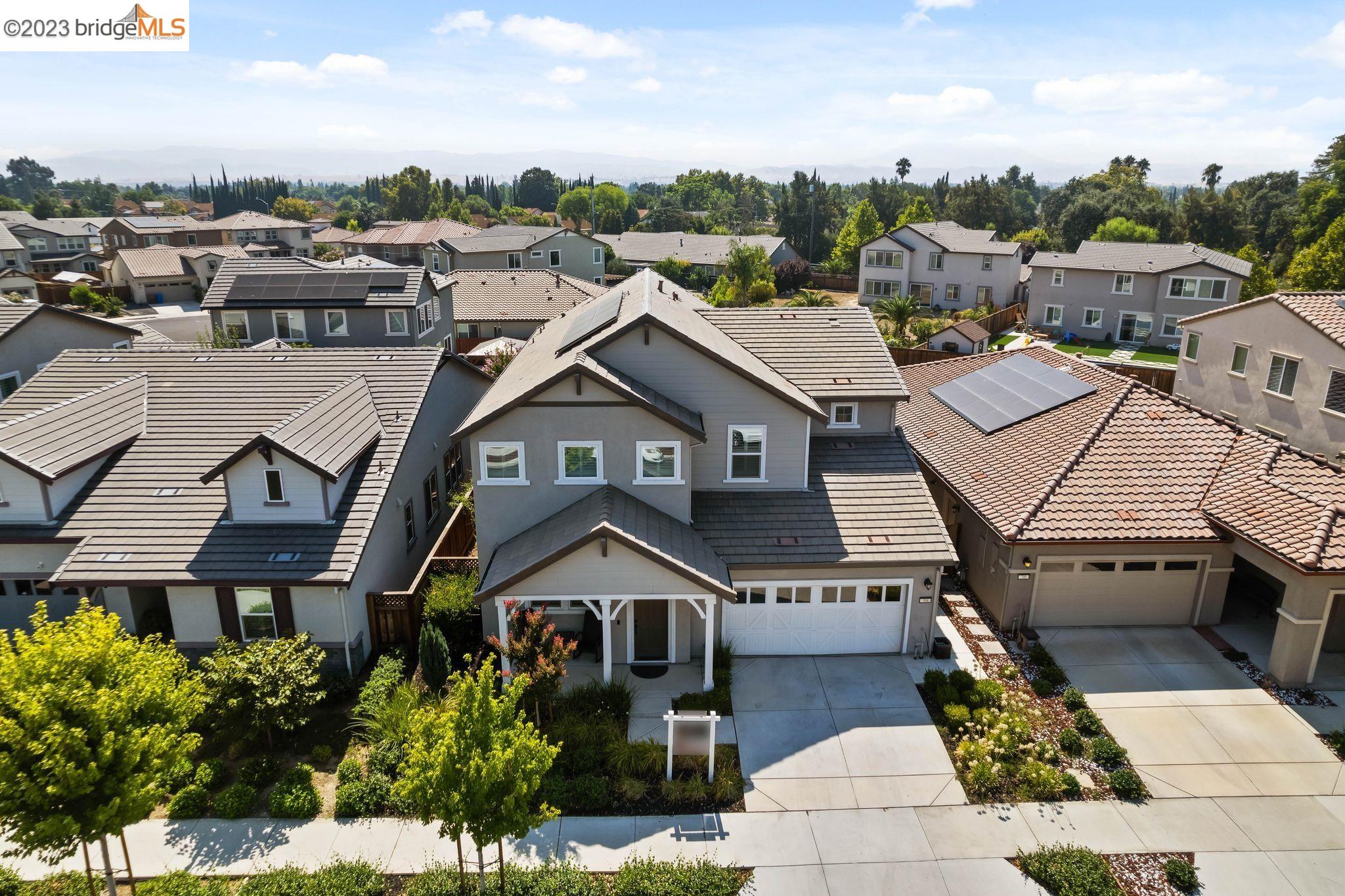 704 Cabada Drive Brentwood, CA 94513 - Photo 1 of 56 a aerial view of a house with a yard