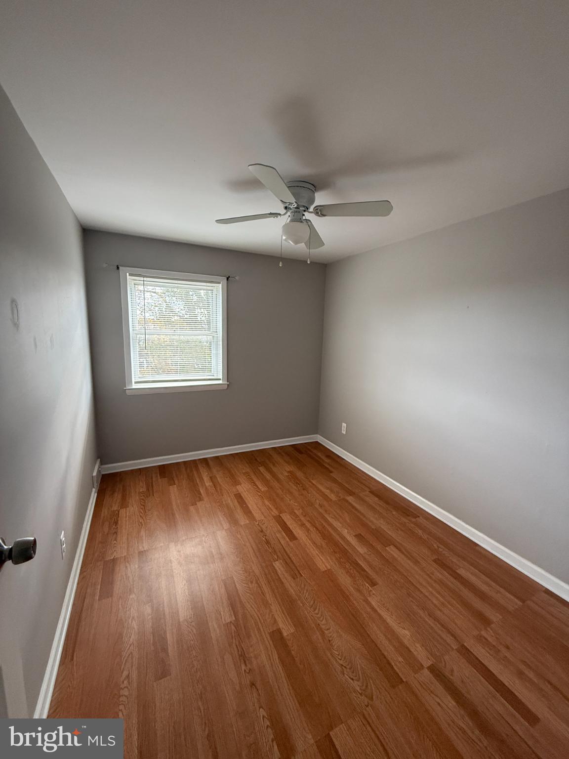 12789 Dunks Road Philadelphia, PA 19154 - Photo 13 of 23 wooden floor in an empty room with a window