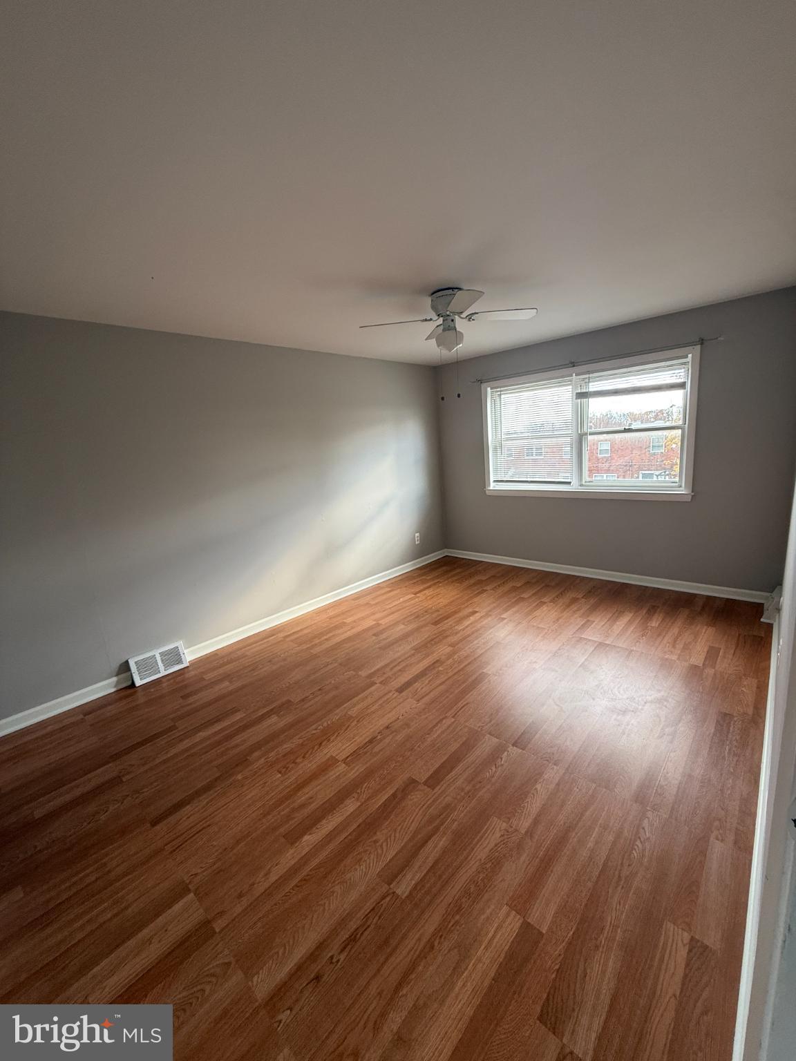 12789 Dunks Road Philadelphia, PA 19154 - Photo 14 of 23 an empty room with wooden floor and windows