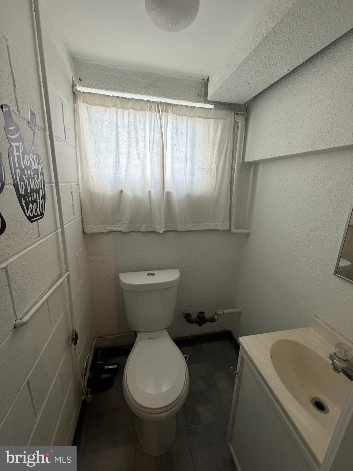 12789 Dunks Road Philadelphia, PA 19154 - Photo 17 of 23 a bathroom with a sink and toilet