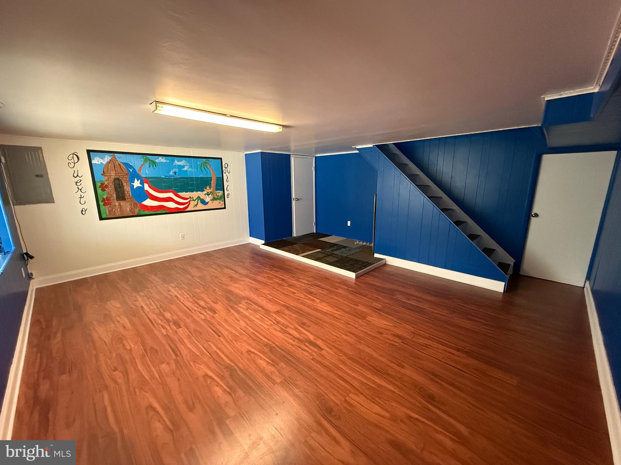 12789 Dunks Road Philadelphia, PA 19154 - Photo 20 of 23 a view of a room with wooden floor and painting on the wall