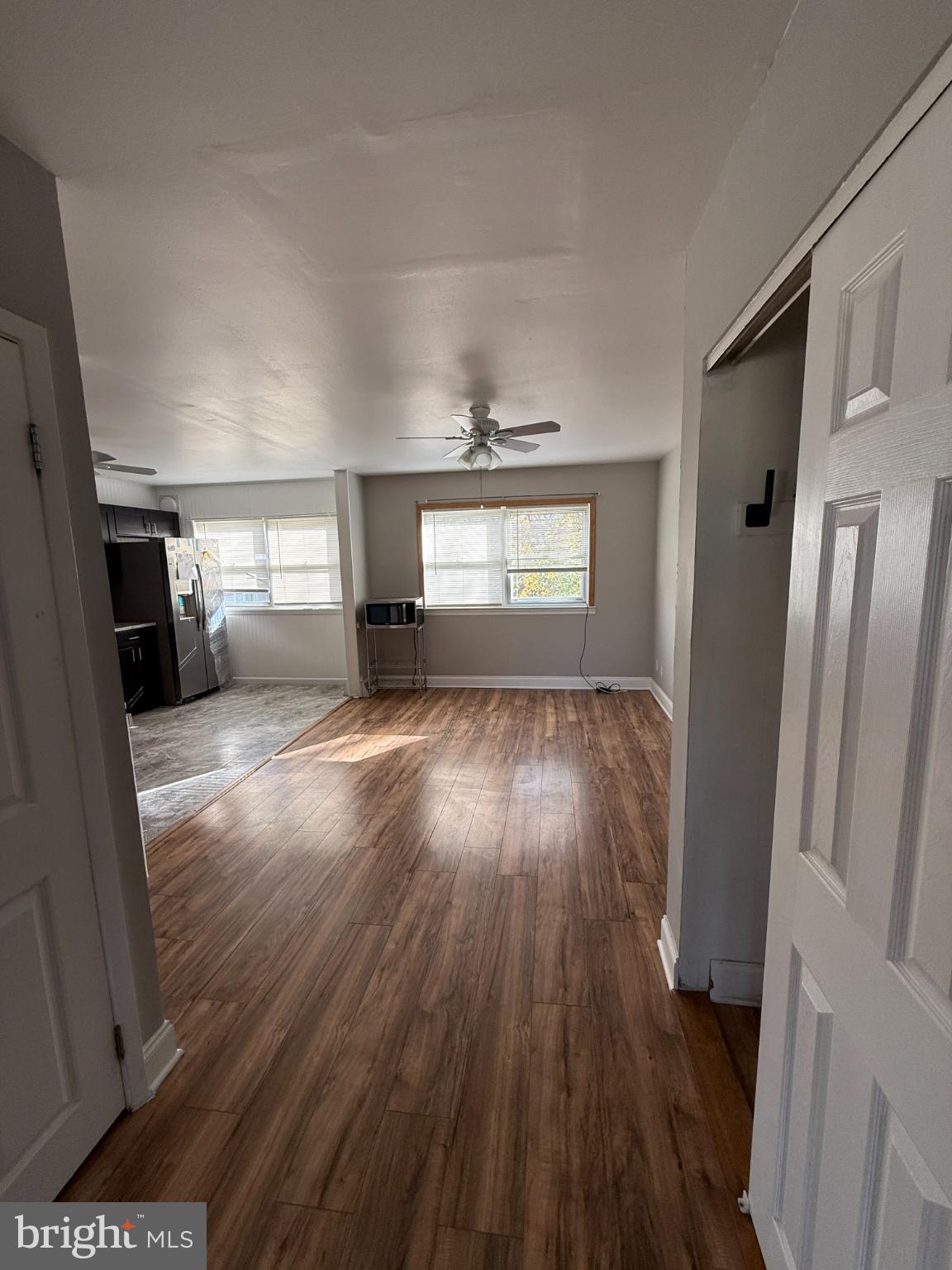 12789 Dunks Road Philadelphia, PA 19154 - Photo 9 of 23 an empty room with wooden floor and windows
