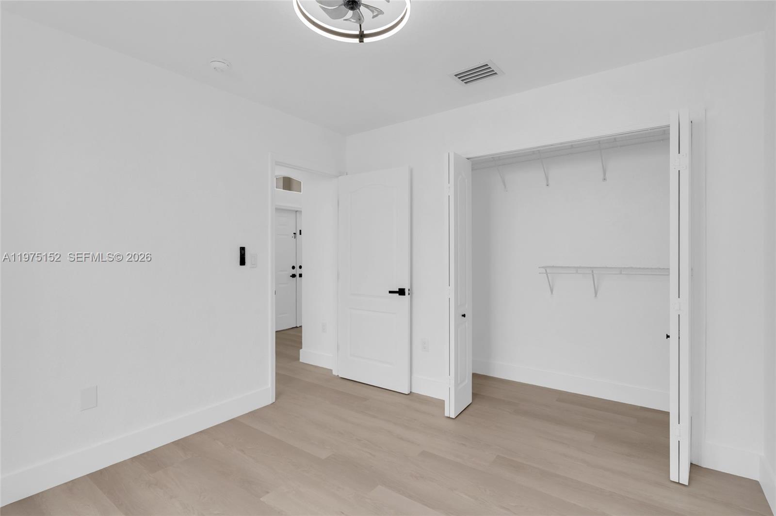 16333 Southwest 68th Terrace Miami, FL 33193 - Photo 11 of 32 a view of an empty room