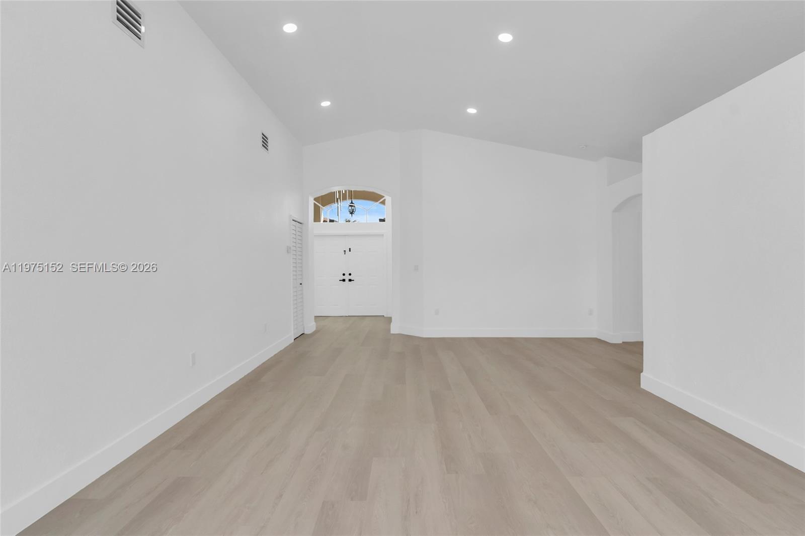 16333 Southwest 68th Terrace Miami, FL 33193 - Photo 12 of 32 a view of a room with wooden floor