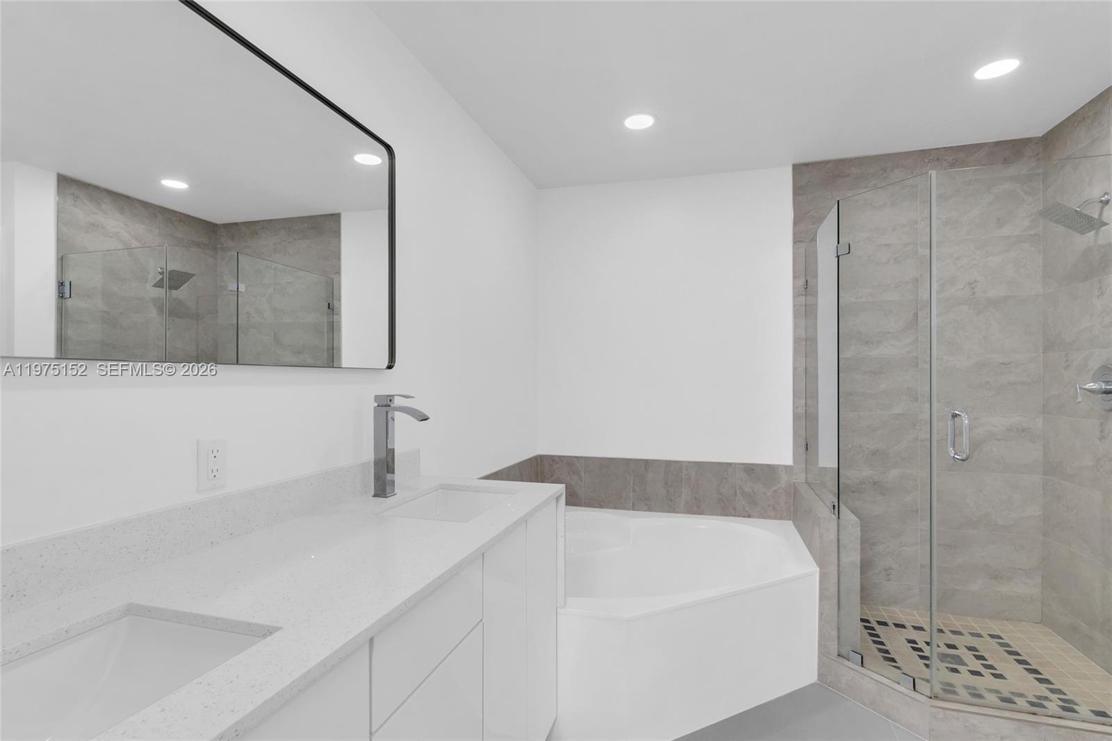 16333 Southwest 68th Terrace Miami, FL 33193 - Photo 17 of 32 a bathroom with a sink a toilet and shower