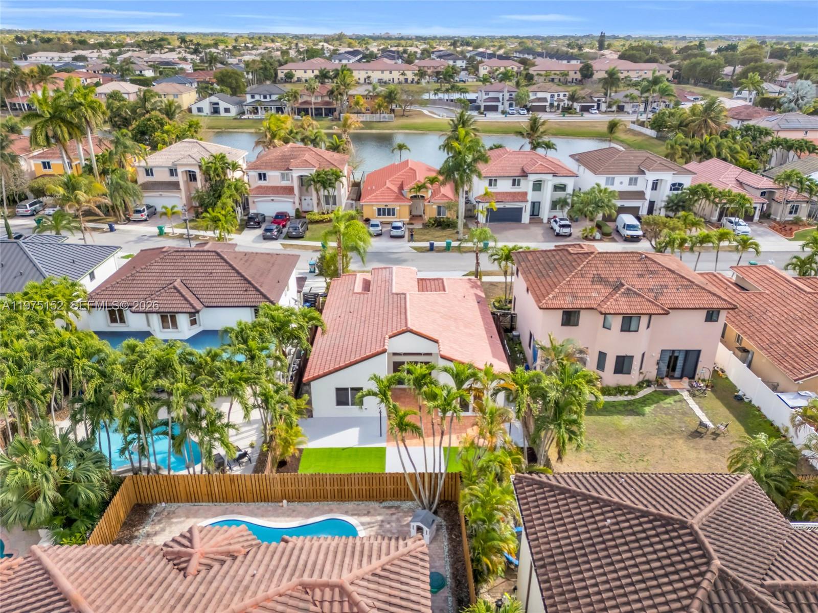 16333 Southwest 68th Terrace Miami, FL 33193 - Photo 28 of 32 an aerial view of residential houses with outdoor space