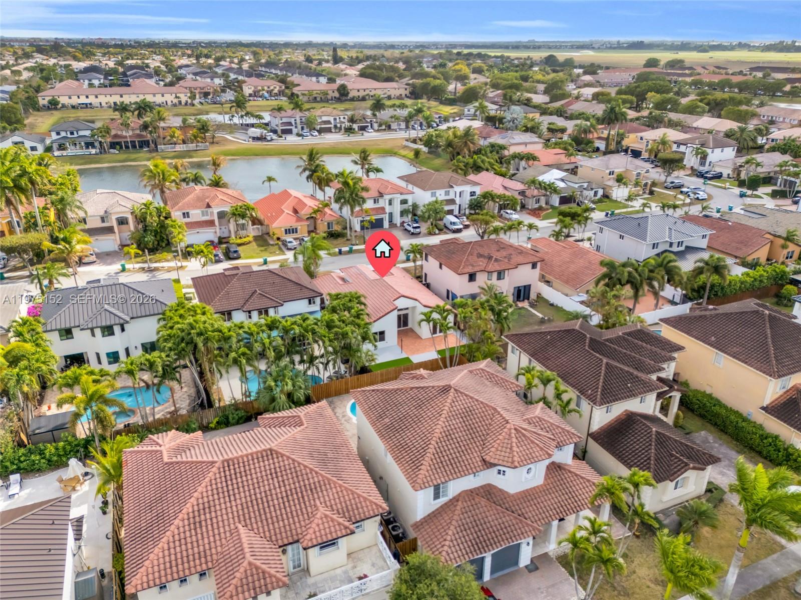 16333 Southwest 68th Terrace Miami, FL 33193 - Photo 31 of 32 an aerial view of residential houses with outdoor space