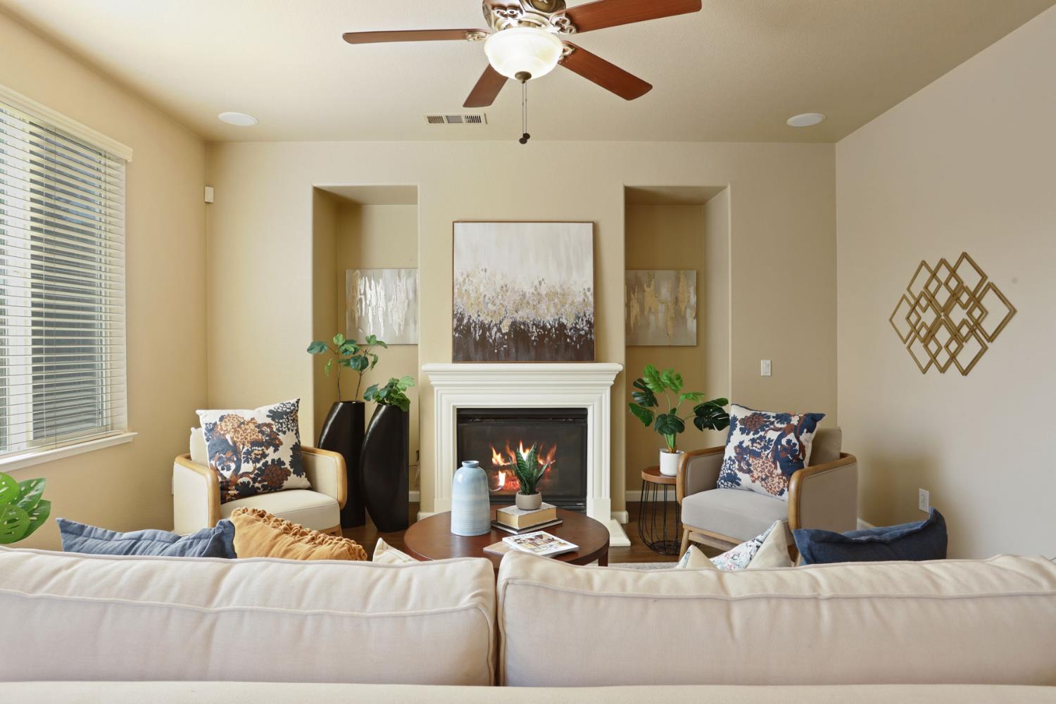 5948 Pebblestone Way Stockton, CA 95219 - Photo 19 of 46 a living room with furniture and a fireplace