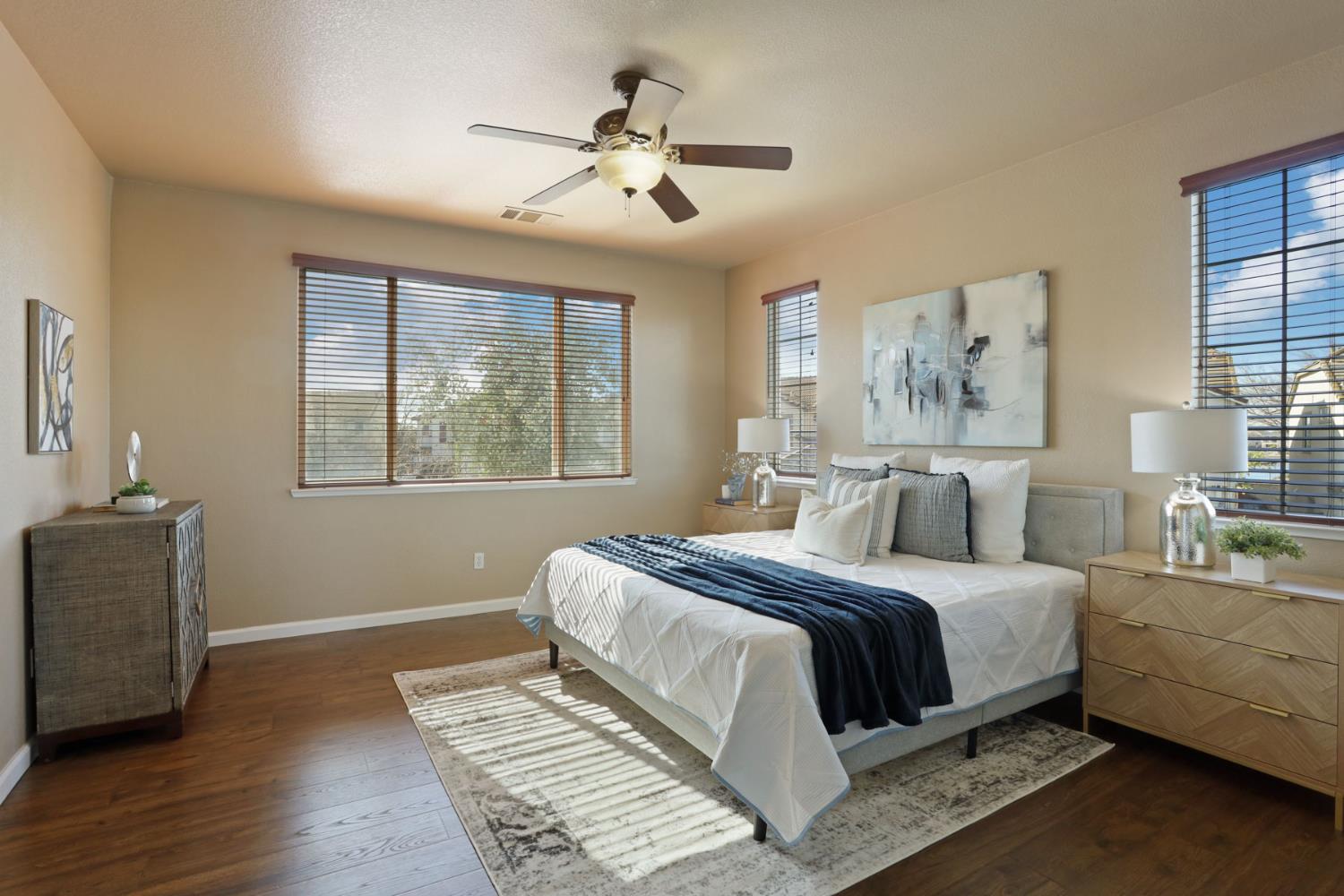 5948 Pebblestone Way Stockton, CA 95219 - Photo 23 of 46 a bedroom with a large bed and a window