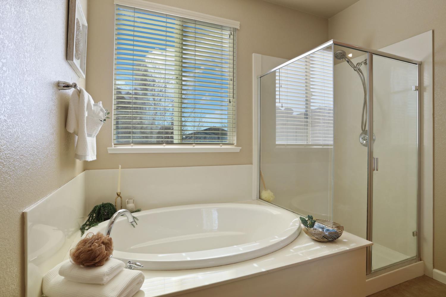 5948 Pebblestone Way Stockton, CA 95219 - Photo 28 of 46 a bathroom with a tub and a sink