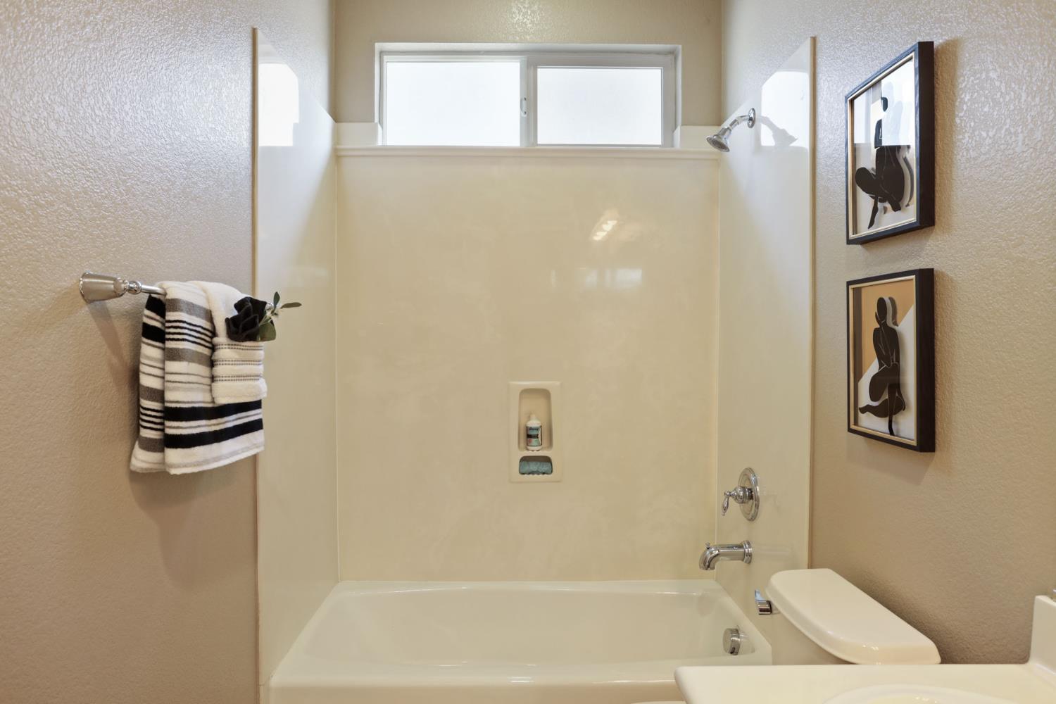 5948 Pebblestone Way Stockton, CA 95219 - Photo 37 of 46 a bathroom with a bathtub