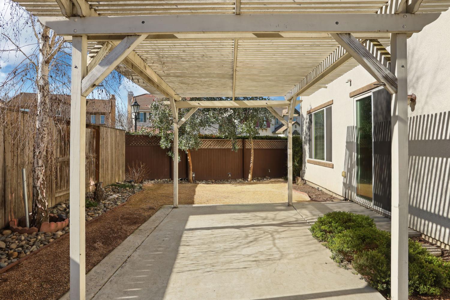 5948 Pebblestone Way Stockton, CA 95219 - Photo 42 of 46 a view of a entryway door front of house