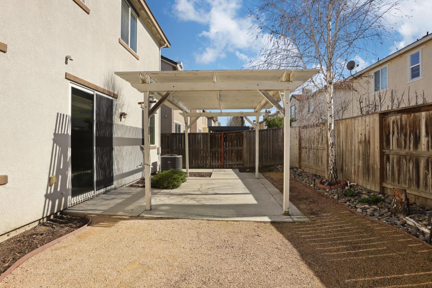5948 Pebblestone Way Stockton, CA 95219 - Photo 44 of 46 a view of a entrance gate of the house