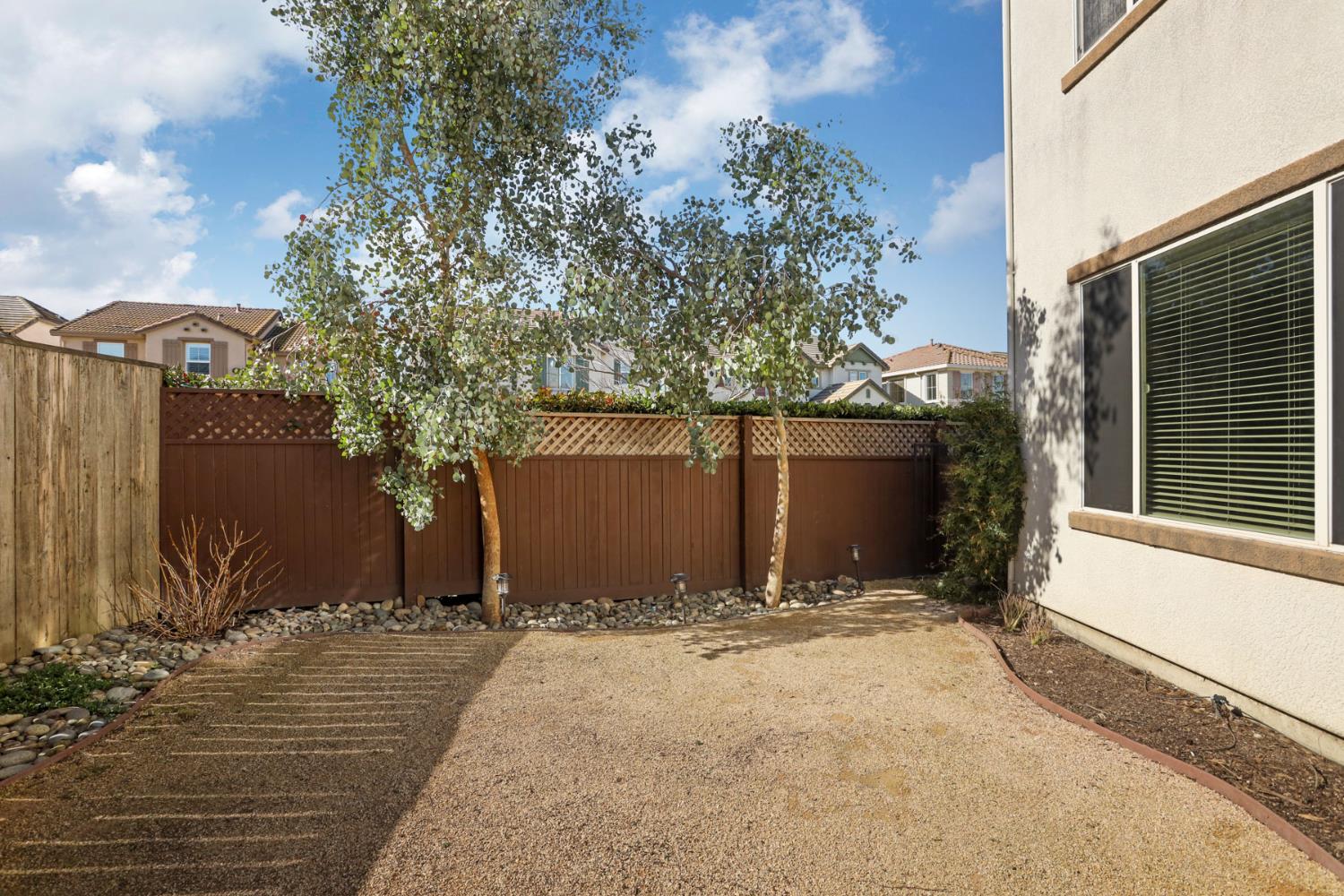 5948 Pebblestone Way Stockton, CA 95219 - Photo 46 of 46 a view of a house with a yard
