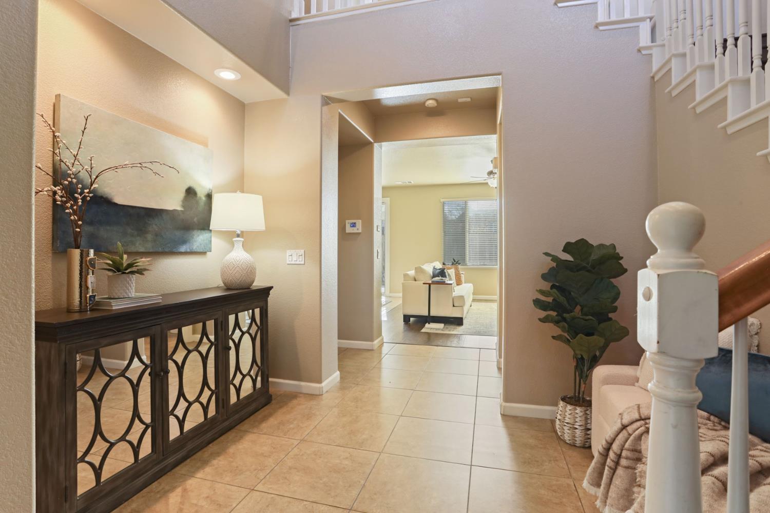 5948 Pebblestone Way Stockton, CA 95219 - Photo 7 of 46 a close view of a sink and a mirror