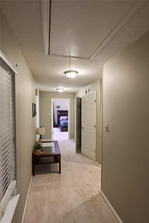 32 Rue Maison Abilene, TX 79605 - Photo 26 of 40 a living room with furniture and a chandelier