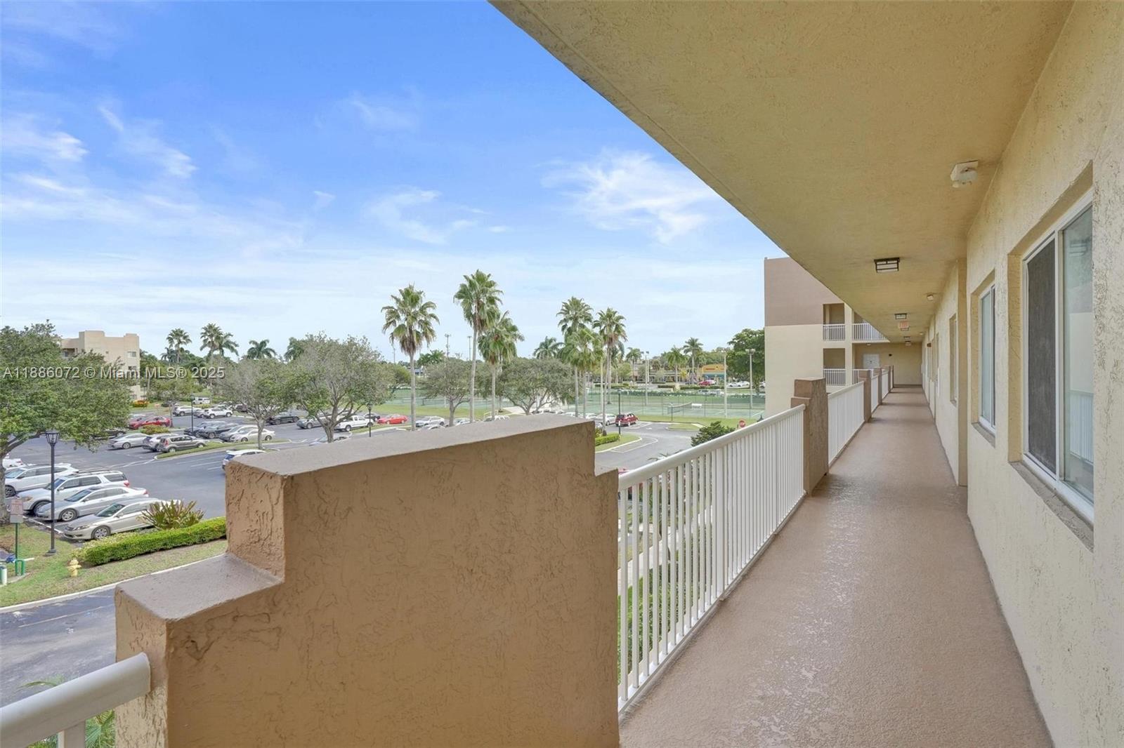 7635 Southampton Terrace, Unit 307 Tamarac, FL 33321 - Photo 39 of 43 a view of a balcony with an outdoor seating