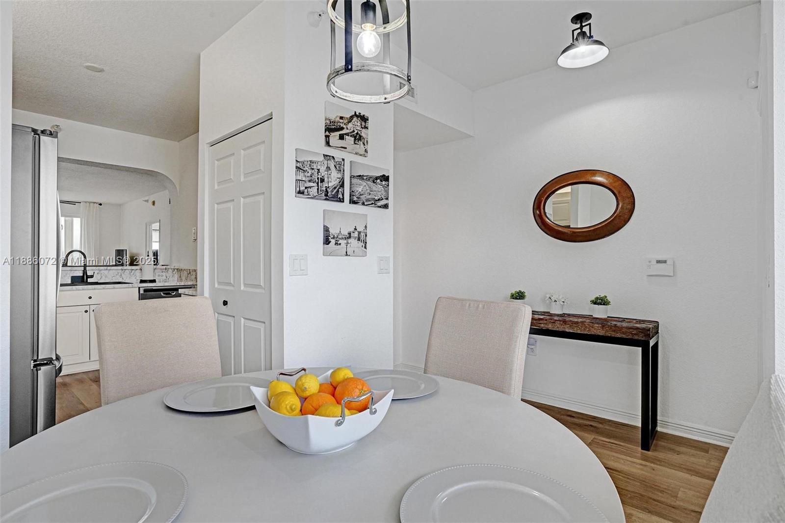 7635 Southampton Terrace, Unit 307 Tamarac, FL 33321 - Photo 5 of 43 a bathroom with a sink mirror and toilet