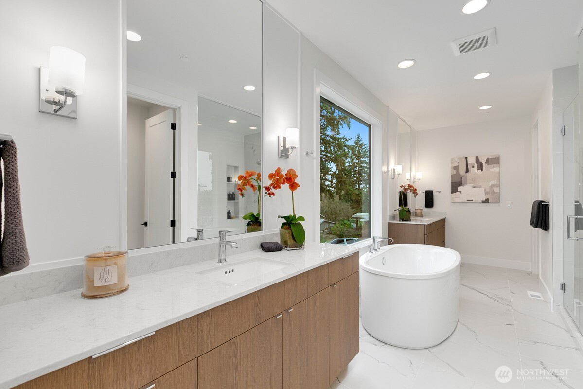 1455 153rd Place Southeast Bellevue, WA 98007 - Photo 26 of 39 a bathroom with a toilet sink and mirror