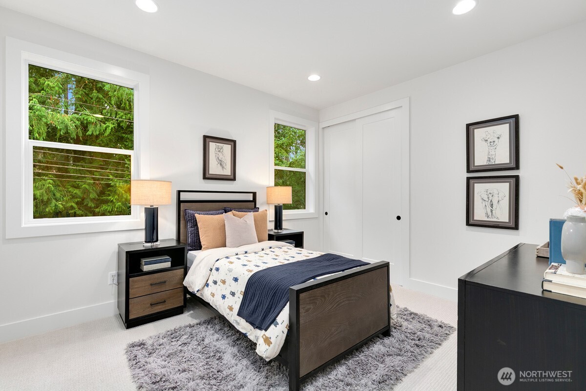 1455 153rd Place Southeast Bellevue, WA 98007 - Photo 29 of 39 a bedroom with a bed and a window