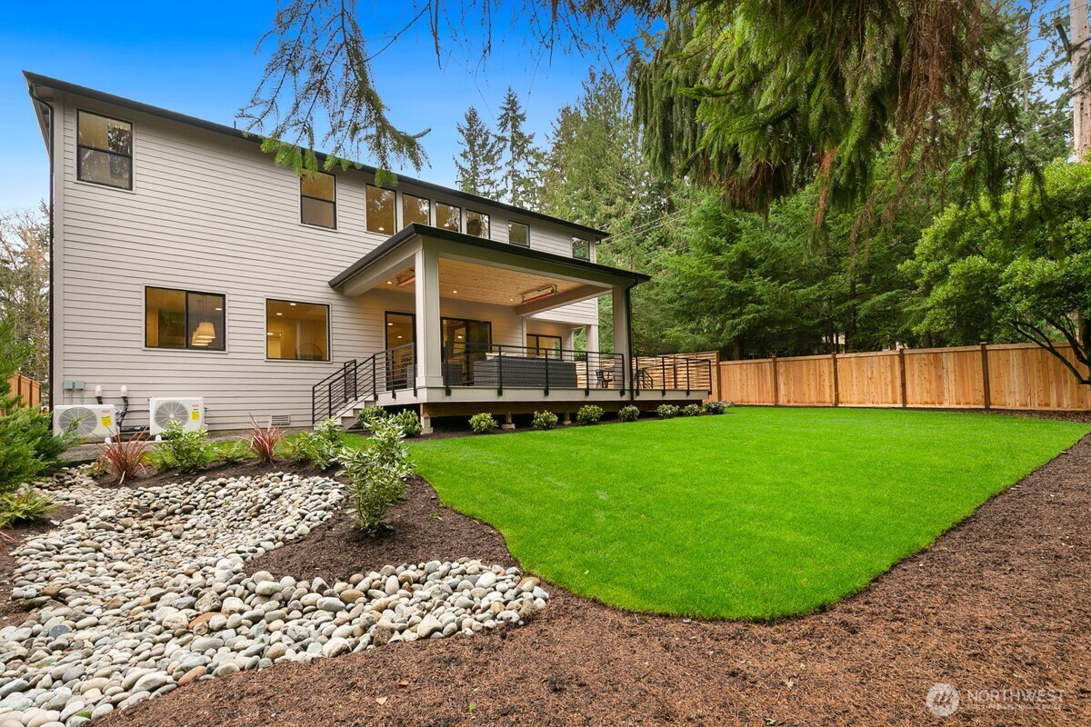 1455 153rd Place Southeast Bellevue, WA 98007 - Photo 37 of 39 a view of a house with a backyard