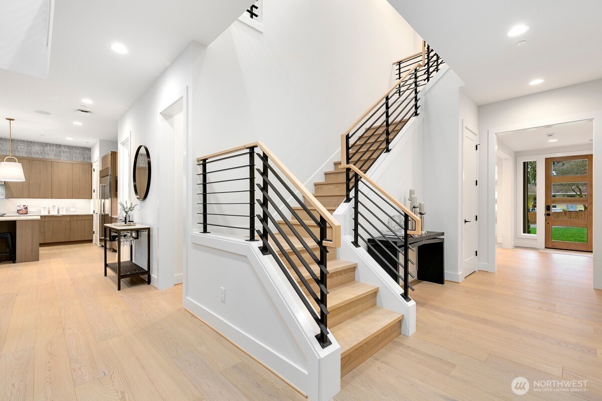 1455 153rd Place Southeast Bellevue, WA 98007 - Photo 4 of 39 a view of entryway and hall with dining room