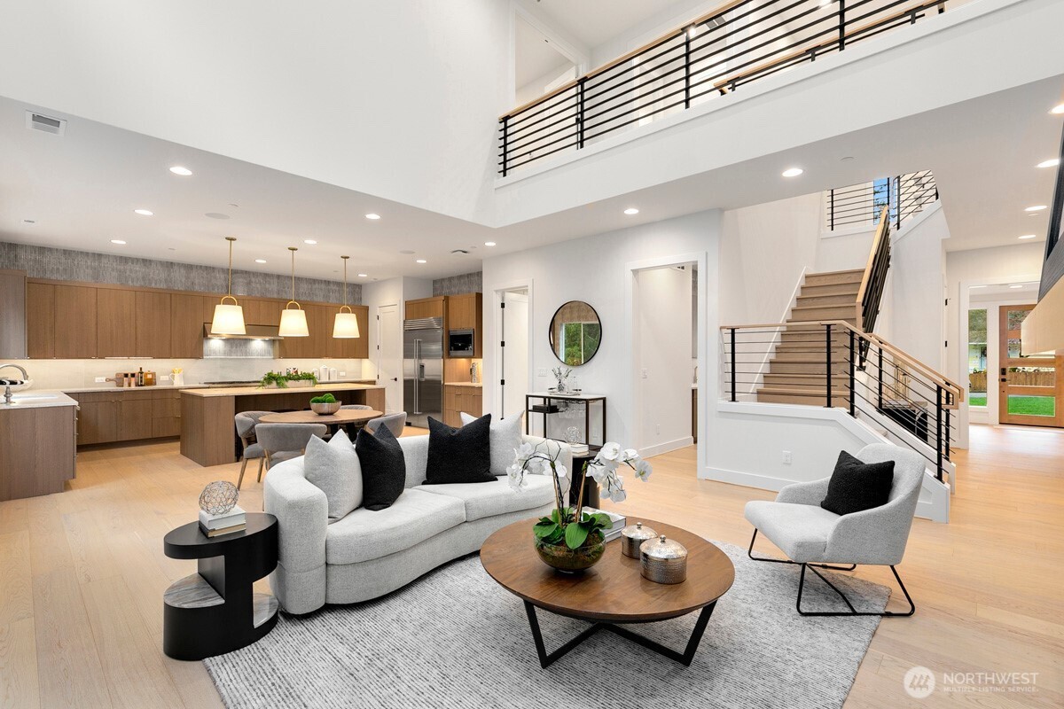 1455 153rd Place Southeast Bellevue, WA 98007 - Photo 9 of 39 a living room with furniture kitchen view and a table