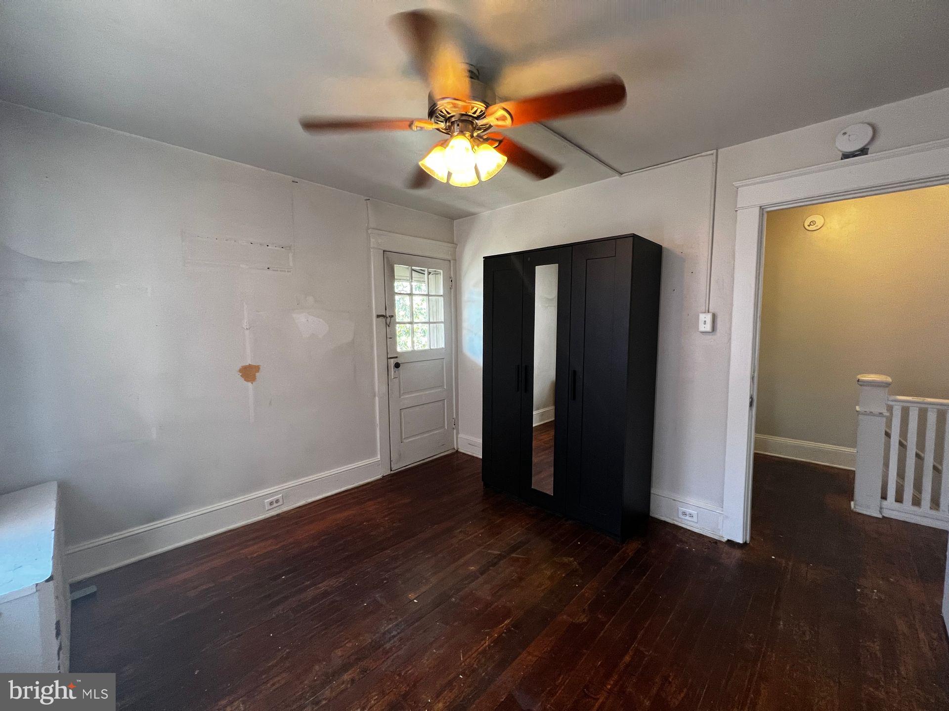 310 West Jackson Street York, PA 17401 - Photo 13 of 13 a view of an empty room with wooden floor and a window