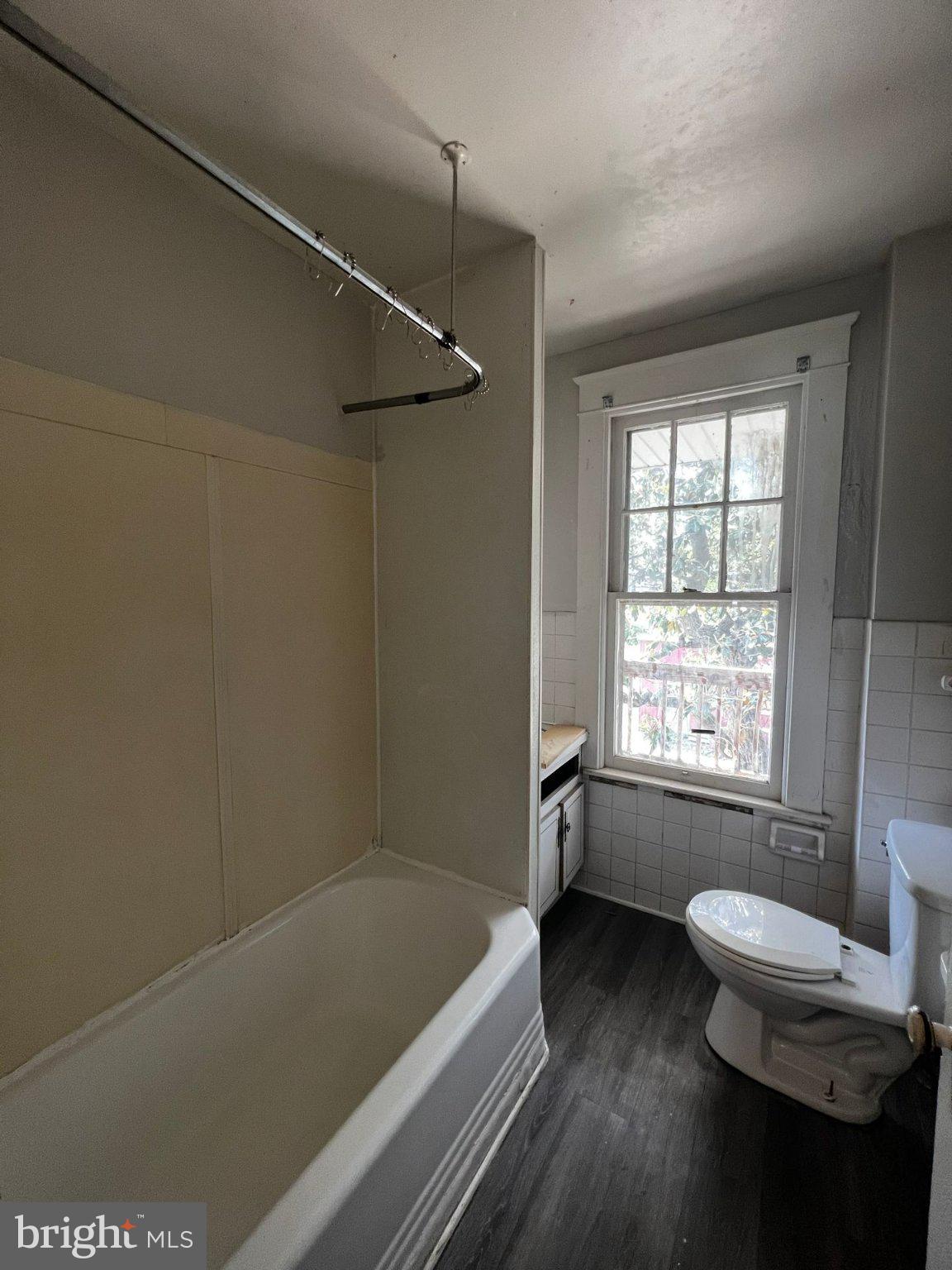 310 West Jackson Street York, PA 17401 - Photo 8 of 13 a bathroom with a sink a toilet and bathtub