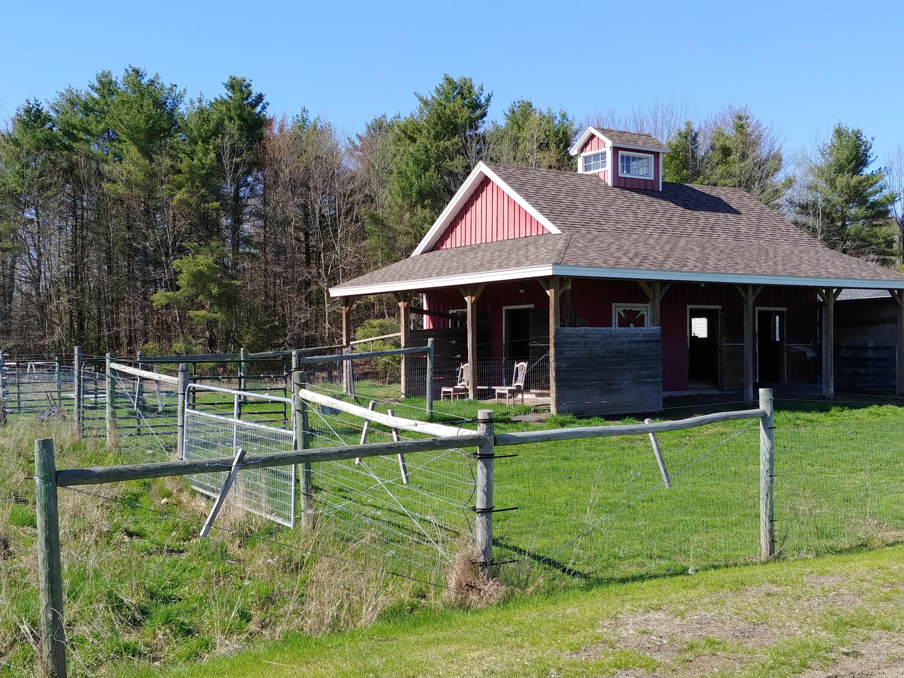 150 Eight Rod Road Augusta, ME 04330 - Photo 33 of 37 Barn to pasture & arena