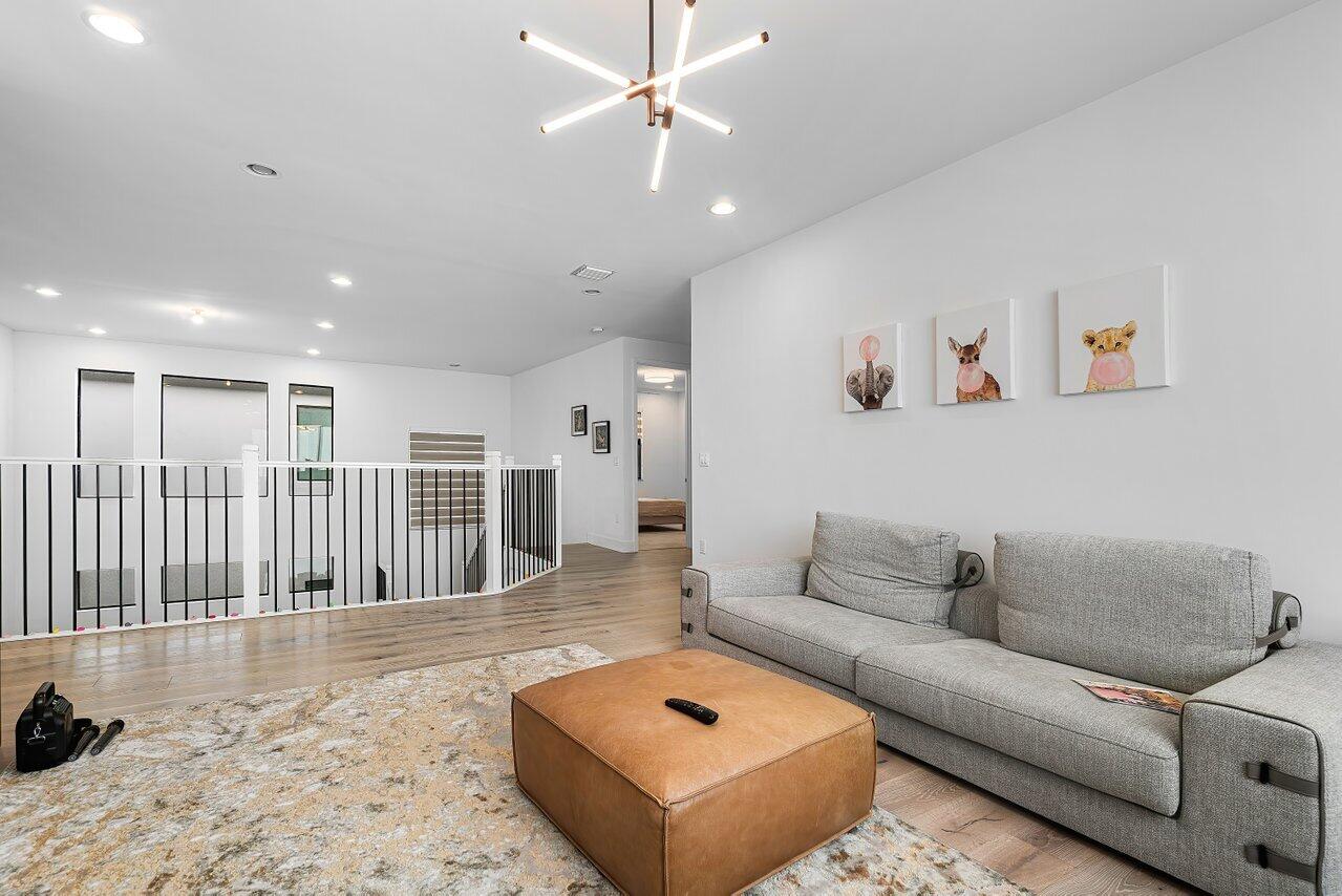 17092 Teton River Road Boca Raton, FL 33496 - Photo 20 of 58 a living room with furniture and a wooden floor