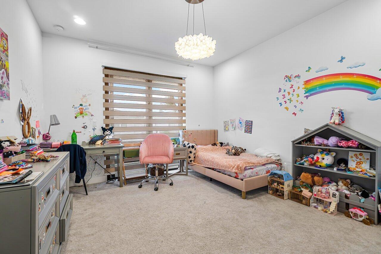 17092 Teton River Road Boca Raton, FL 33496 - Photo 22 of 58 a bedroom with furniture and a fan