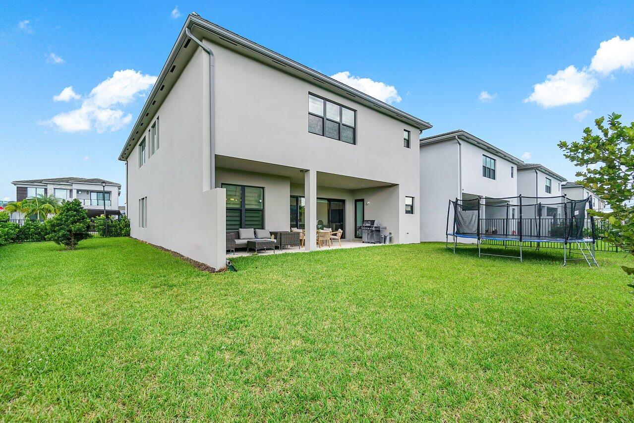 17092 Teton River Road Boca Raton, FL 33496 - Photo 33 of 58 a view of a house with a yard