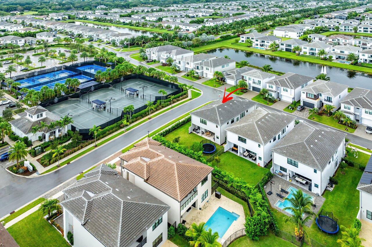 17092 Teton River Road Boca Raton, FL 33496 - Photo 36 of 58 an aerial view of a house with a swimming pool outdoor seating and yard