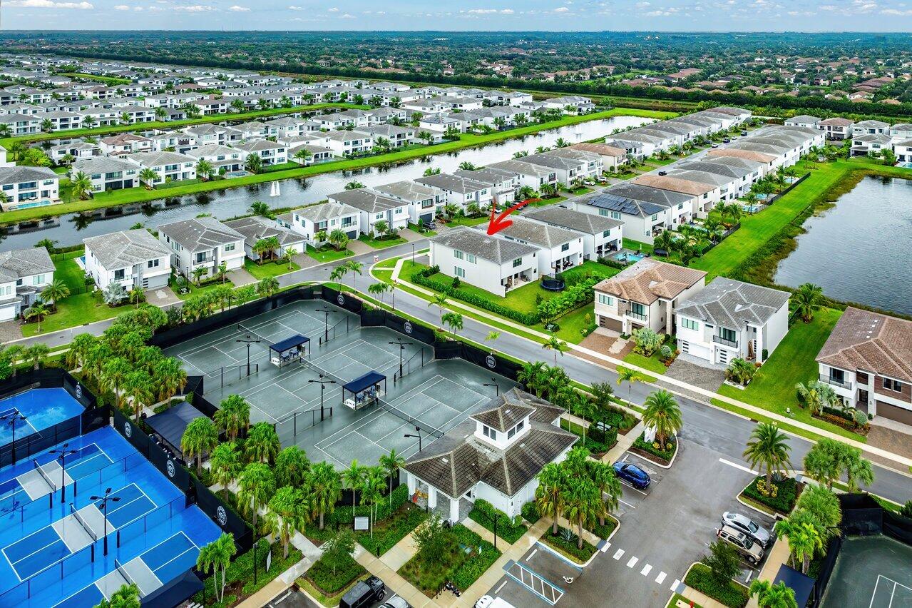 17092 Teton River Road Boca Raton, FL 33496 - Photo 37 of 58 an aerial view of residential houses with outdoor space and river