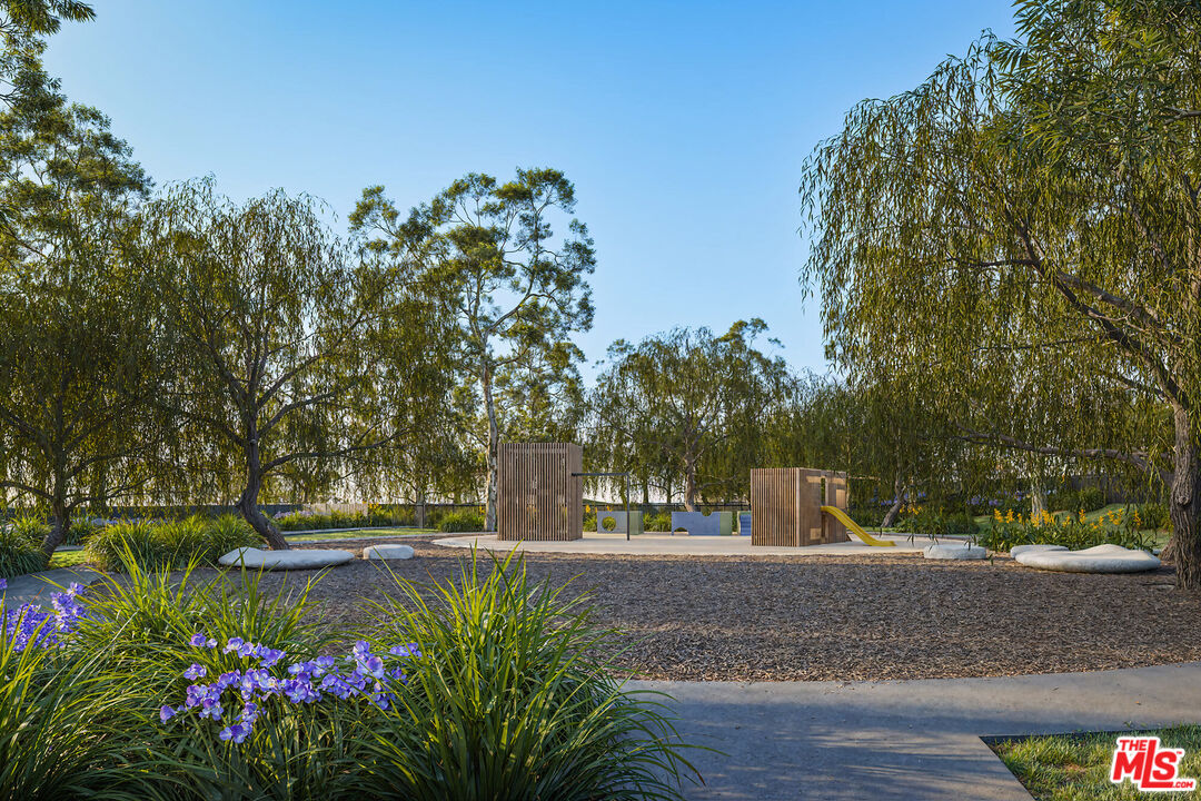 6489 Cavalleri Road, Unit 304 Malibu, CA 90265 - Photo 14 of 17 a view of a park with large trees