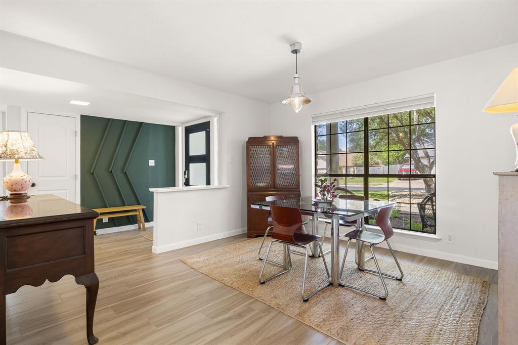 1729 Ryon Lane Round Rock, TX 78681 - Photo 3 of 27 Accent wall in the entry way and large dining room - easy entertaining!