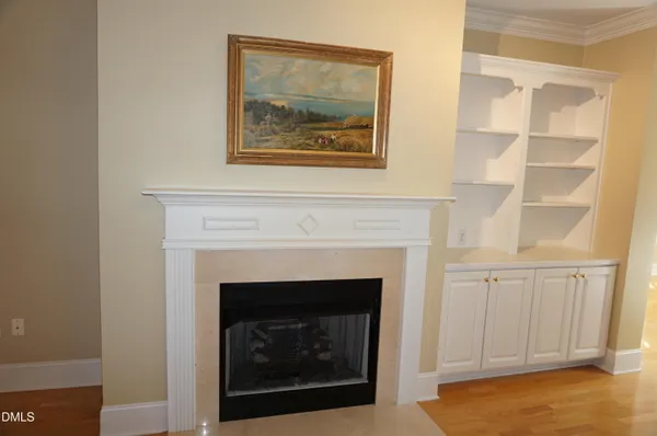 a white building with a fireplace